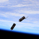 Illustration for article titled These Tiny Satellites Just Left The International Space Station